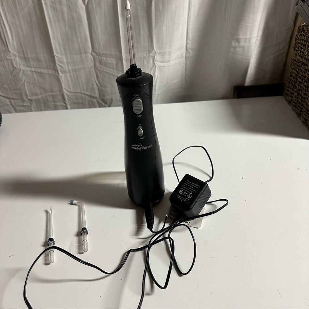Black Waterpik Water Flosser with Accessories
